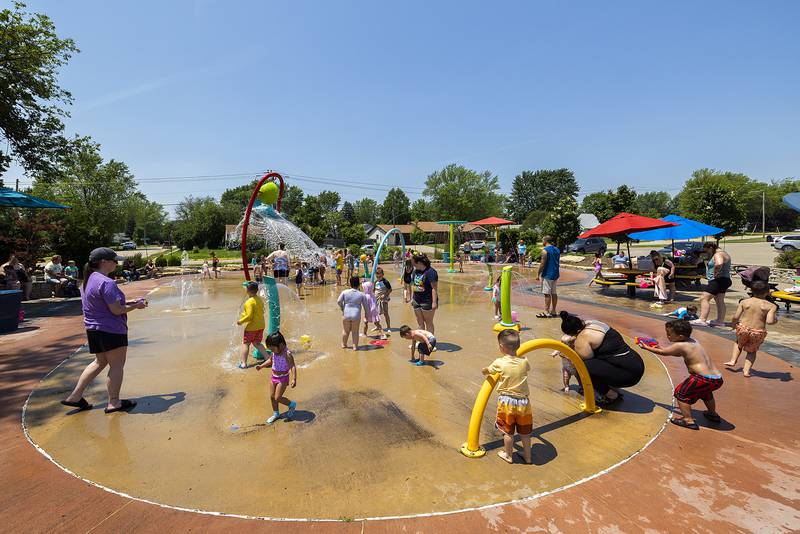 The Water Wonderland splash pad in Dixon was jammed with people looking for a place to cool off Wednesday, June 11, 2025.