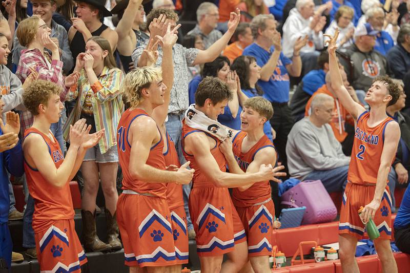 The Eastland bench celebrates their win over Dakota 49-31 Wednesday, March 4, 2026, in the Orion 1A sectional semifinal. Eastland will play Pecatonica for the title.