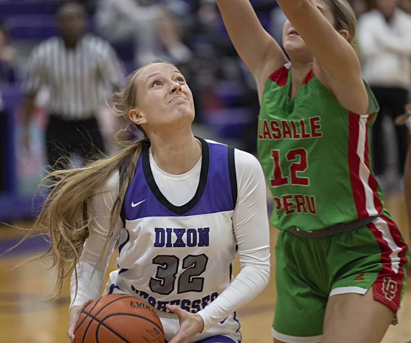 Dixon’s Makenzie Toms looks to put up a shot against LaSalle-Peru’s Phoebe Shetterly Thursday, Nov. 30, 2023 in Dixon.