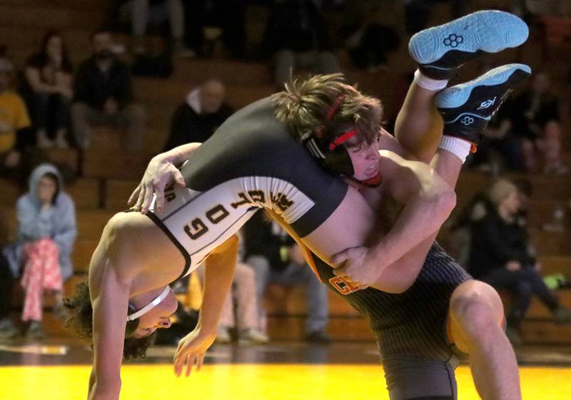 Jacobs’ Gavin Greco, left, battles Crystal Lake Central’s Dylan Ramsey at 126 pounds in varsity wrestling on Thursday, Jan. 16, 2025, at Jacobs High School in Algonquin.