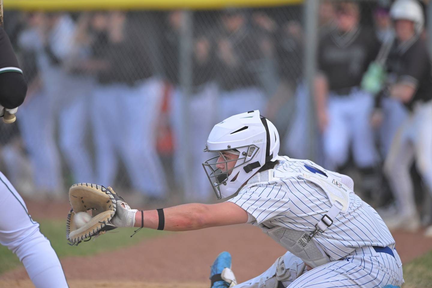 Geneva’s Alex Abraham takes a pitch against Glenbard West in a baseball game in Geneva on Wednesday, Mar. 25, 2026.