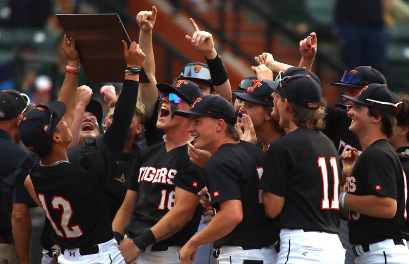 Crystal Lake Central players celebrate a win in supersectional baseball action against DePaul College Prep at Wintrust Field in Schaumburg Monday.