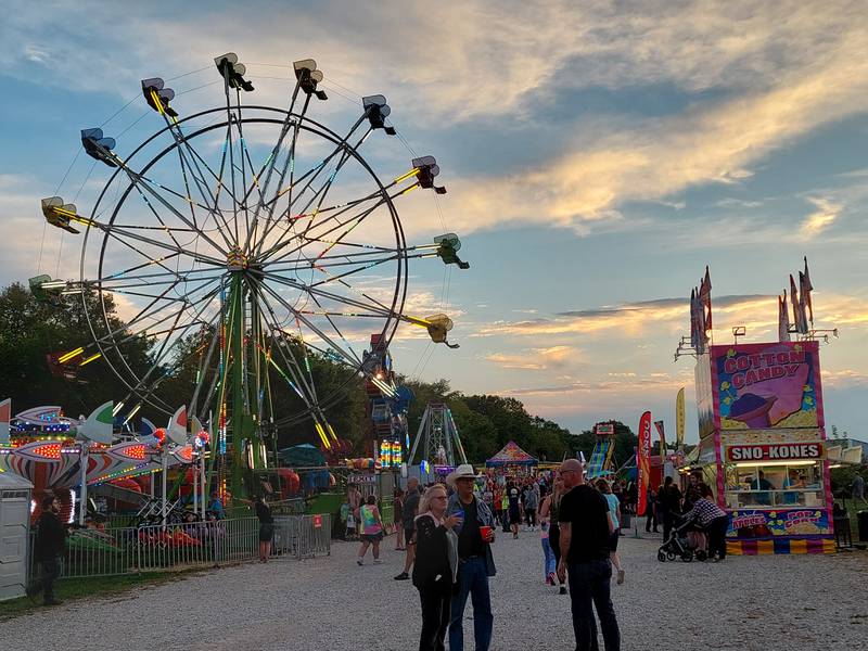 A ferris wheel towers over the carnival Saturday, Sept. 23, 2023, during the Shipyard Days festival in Seneca.