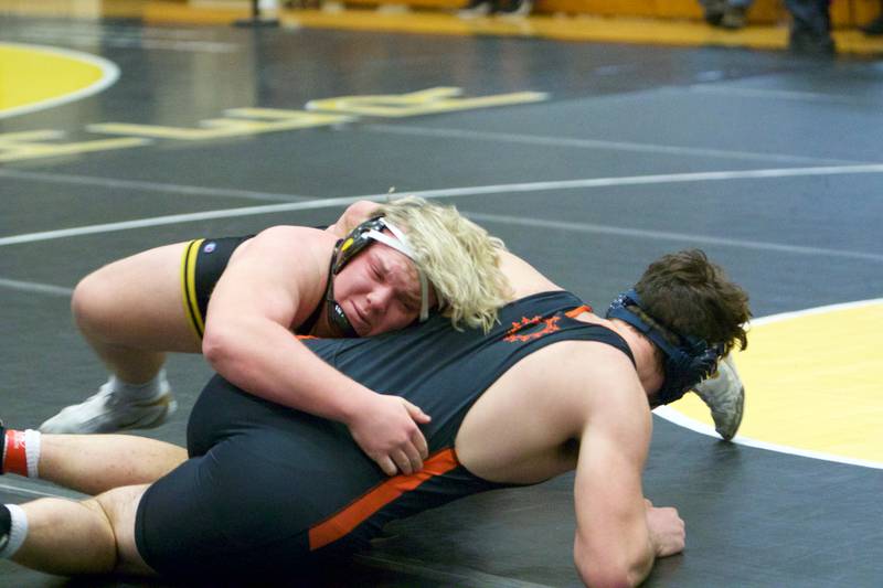 Glenbard North's Paulie Robertson wrestles St. Charles East's Austin Barret in the 285-pound championship round at the DuKane Conference at Glenbard North on Jan. 29, 2022 in Carol Stream.