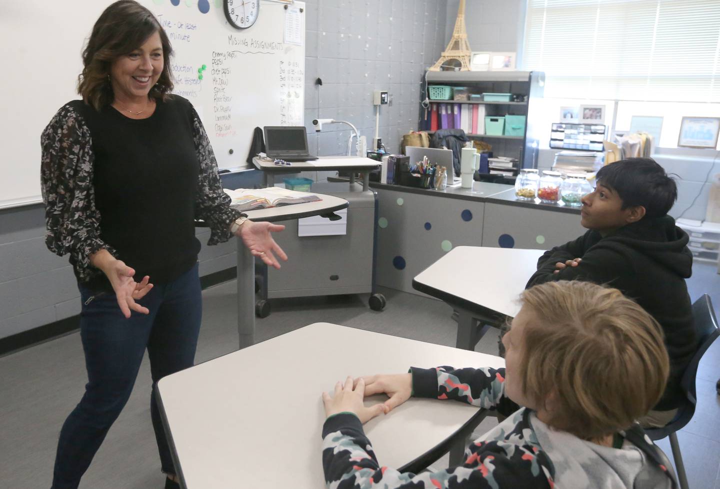 Tracey Schoff, a teacher at Bureau Valley Junior High School, smiles while teaching students Layne Foster and Alex Gallardo on Thursday, April 6, 2023.