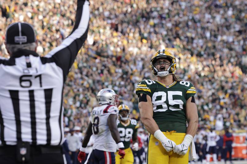Green Bay Packers tight end Robert Tonyan celebrates after catching a 20-yard touchdown pass against the New England Patriots, Sunday, Oct. 2, 2022, in Green Bay, Wis.