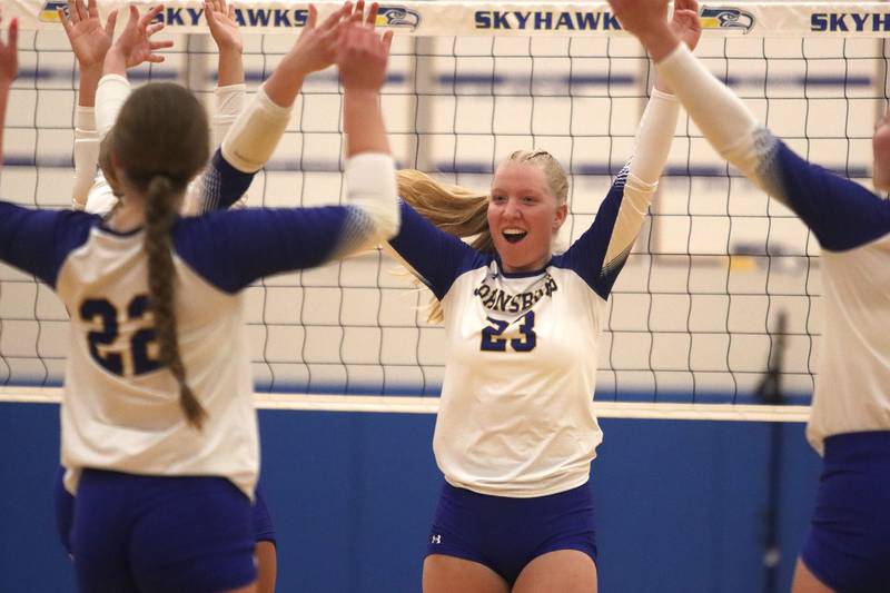 Johnsburg’s Casie Majercik and the Skyhawks celebrate a point against Richmond-Burton in varsity girls volleyball at Johnsburg High School in Johnsburg on Thursday, August 25, 2025.
