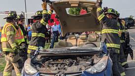 Oswego firefighters show emergency response skills at National Night Out