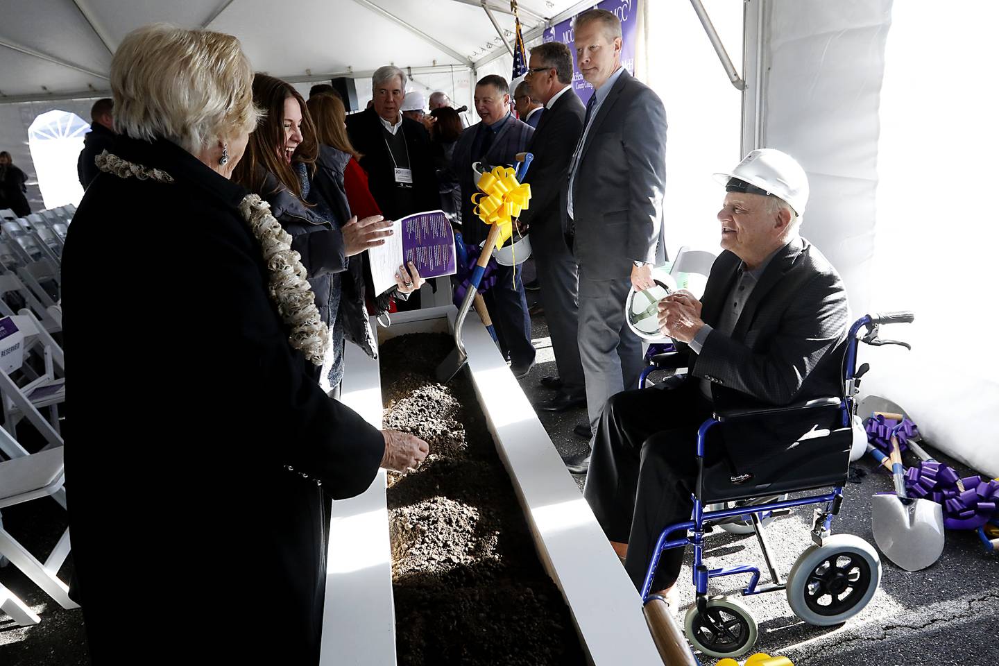 Former Sage Products Chairman and CEO and current Foglia Family Foundation Vice President Vince Foglia talks with people Wednesday, Oct. 19, 2022, during a groundbreaking ceremony for McHenry County College’s Foglia Center for Advanced Technology and Innovation at the Crystal Lake campus.  During the ceremony, speakers spoke about the future of learning in the new center along with education's role in economic development.