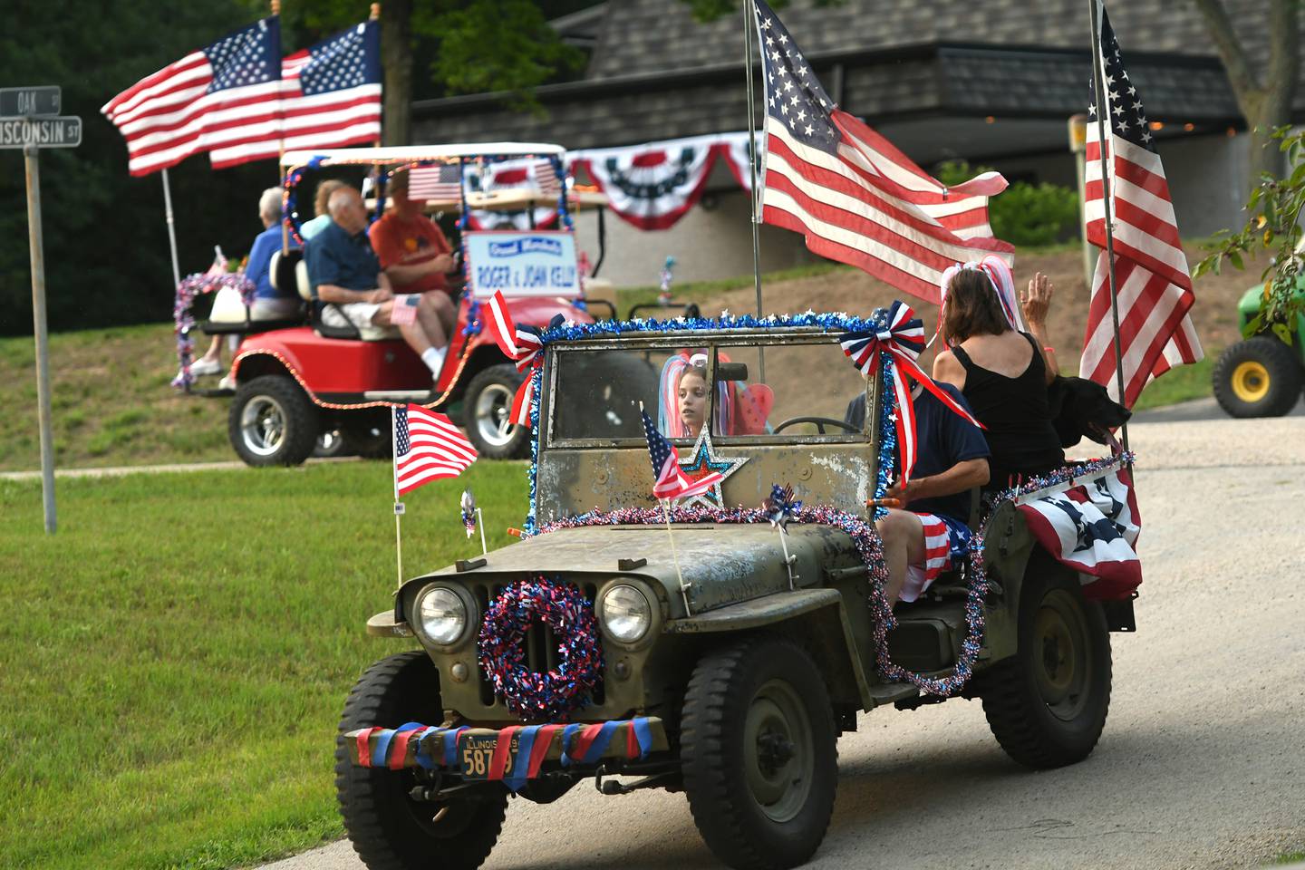 A vintage Jeep, owned by Jim and Connie Ross of Grand Detour, led the start of the 2021 Grand Detour Golf Cart Parade on July 3.