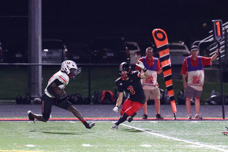 Bradley-Bourbonnais' Lyzale Edmon looks to avoid Lincoln-Way Central's Nolan Morrill during the Knight's 28-20 victory over Bradley-Bourbonnais on Friday, Oct. 3, 2025.