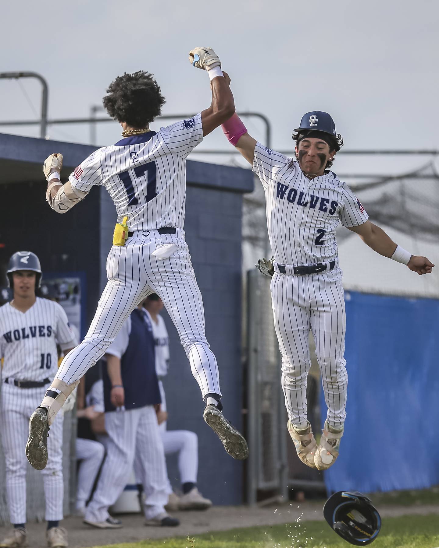 Oswego East's Jacsen Tucker (17) celebrates his homerun with Devin Wheaton (2) during baseball game between Plainfield North at Oswego East, Monday, April 28, 2025 in Oswego.