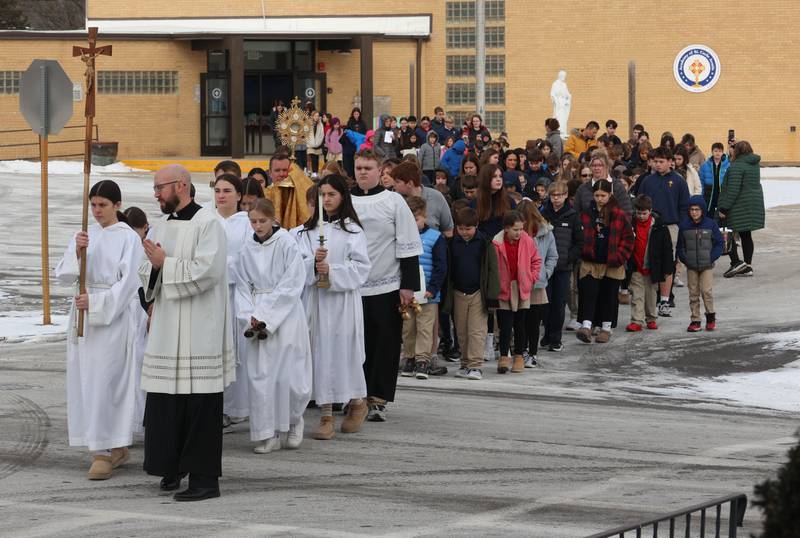 Students from The Academy of St. Carlo Acutis walk during a Eucharistic Procession to St. Joseph’s Catholic Church on Friday, Jan. 30, 2026 in Peru. Over 350 students and staff from Academy of St. Carlo Acutis celebrated the very first all-school Mass.