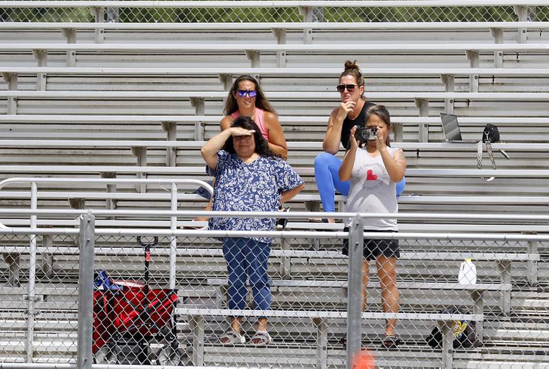Parents watch as there children participate in the Chicago Bears Mini Monsters Flag Football Camp on Wednesday, July 16, 2025. at McCracken Field in McHenry.