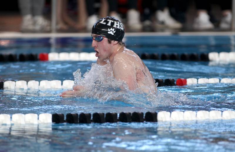 Lyons Township’s Aidan Foley competes in the championship heat of the 100-yard breaststroke during the IHSA Boys Swimming and Diving Championships at FMC Natatorium in Westmont on Saturday, Feb. 26. 2022.