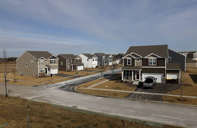 New single-family homes in the Stonewater subdivision in Wonder Lake on Friday, Feb. 24, 2023. When the subdivision is finished, 3,400 to 3,700 more rooftops will be added to Wonder Lake, potentially making the village one of the larger municipalities in McHenry County.