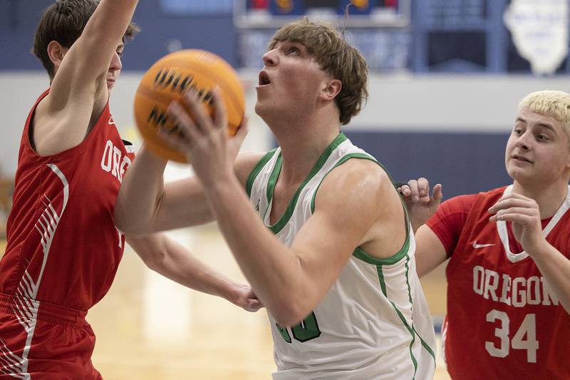 Rock Falls’ Cole Mulnix works below the basket against Oregon Wednesday, Feb. 26, 2025, at the Class 2A Regional semifinal at Bureau Valley High School.
