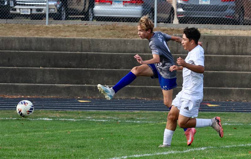 Princeton's Jackson DeRose boots the ball in Saturday's regional quarterfinal soccer match vs. Stanford Olympia at Bryant Field. The Tigers won 6-2.