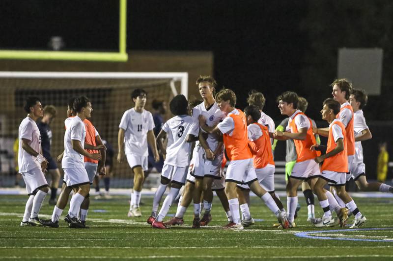 Downers Grove North celebrates their win over Downers Grove South in their soccer match. Oct 2, 2025.