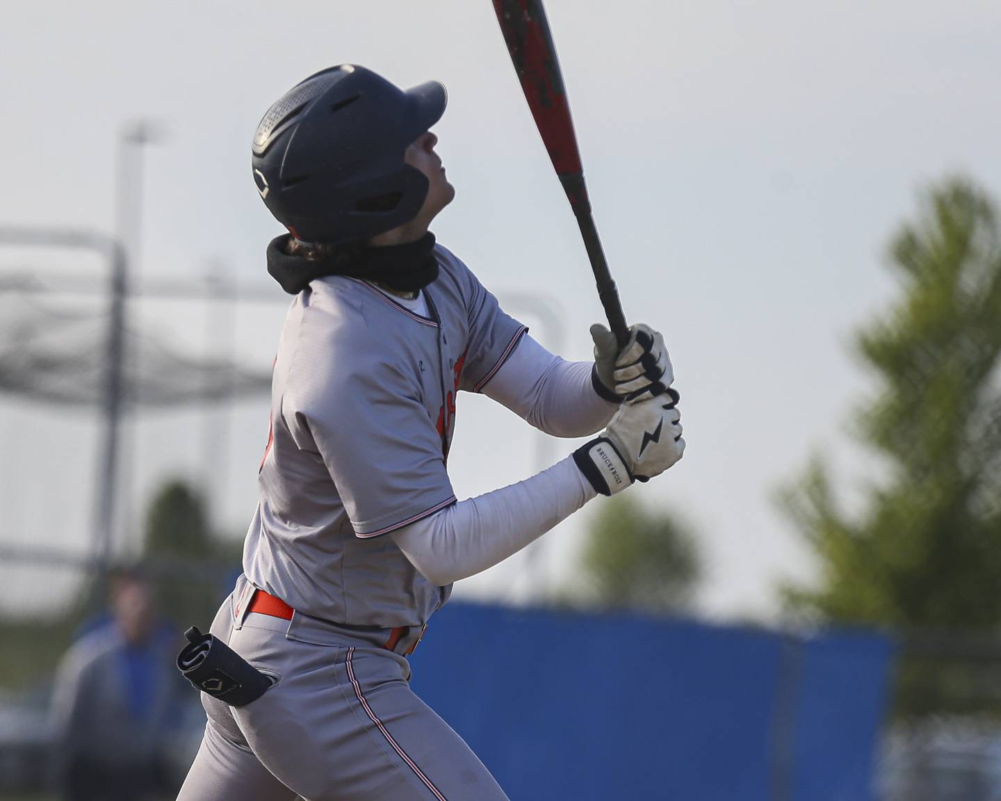 Oswego's Donny Williams (15) follows his fly ball to left during baseball game between Oswego East at Oswego. Monday, May 19, 2025 in Oswego.
