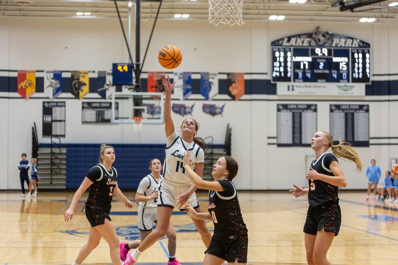 Lake Park's Maggie Frank goes in for the shot against St. Charles East on Wednesday, Jan.7,2026 in Roselle.