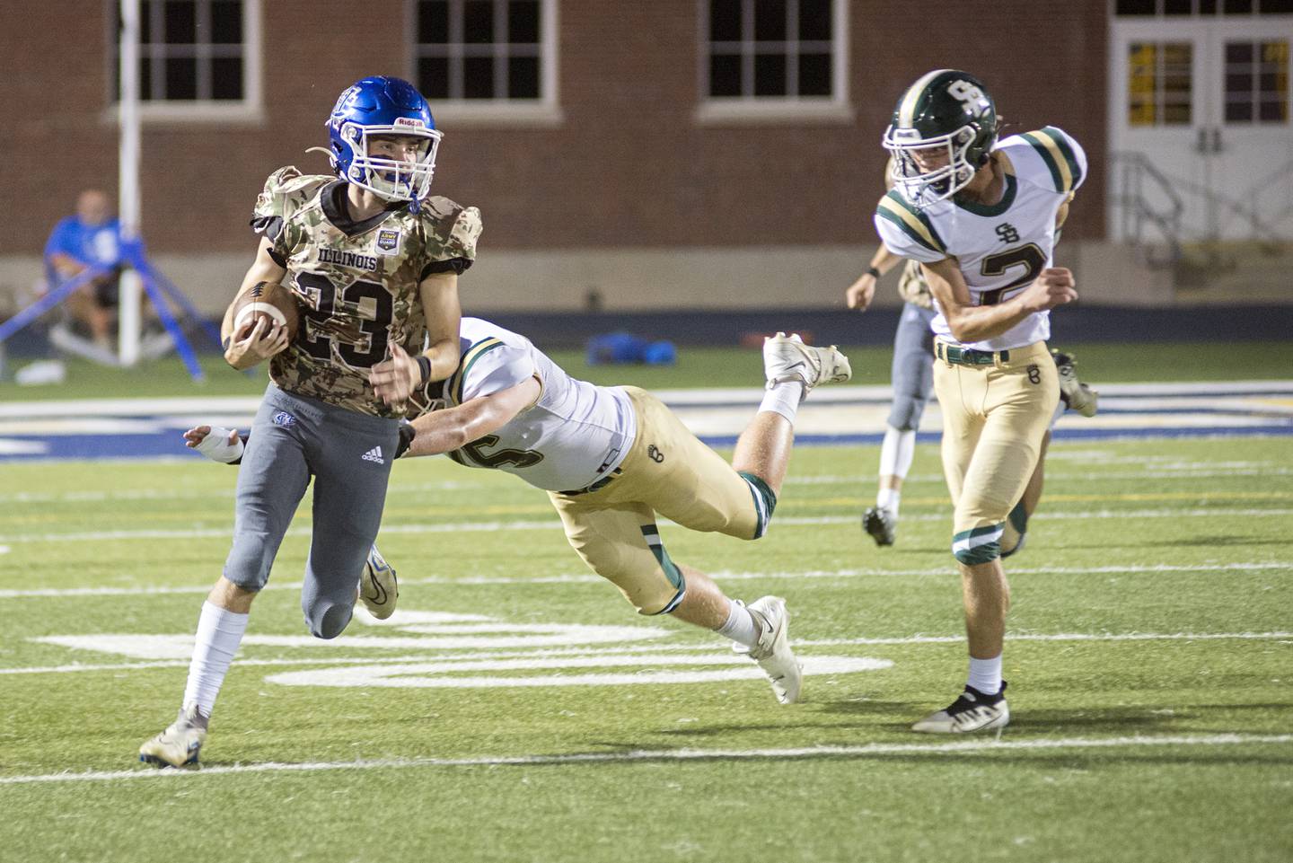 Newman’s Nolan Britt looks for running room against St. Bede Friday, Sept. 16, 2022.