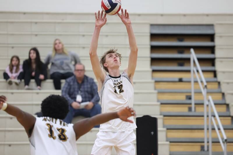 Joliet West’s Landon Brouwer sets the ball against Plainfield Central on Tuesday, April 23, 2024 in Plainfield.