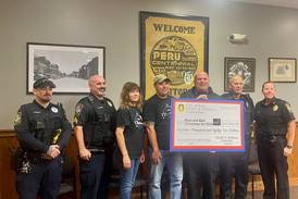 Peru committee raises record $14,000 at golf outing for Christmas charity