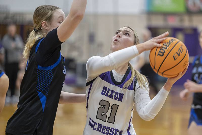 Dixon’s Reese Dambman works to put up a shot against St. Francis Saturday, Jan. 10, 2026.