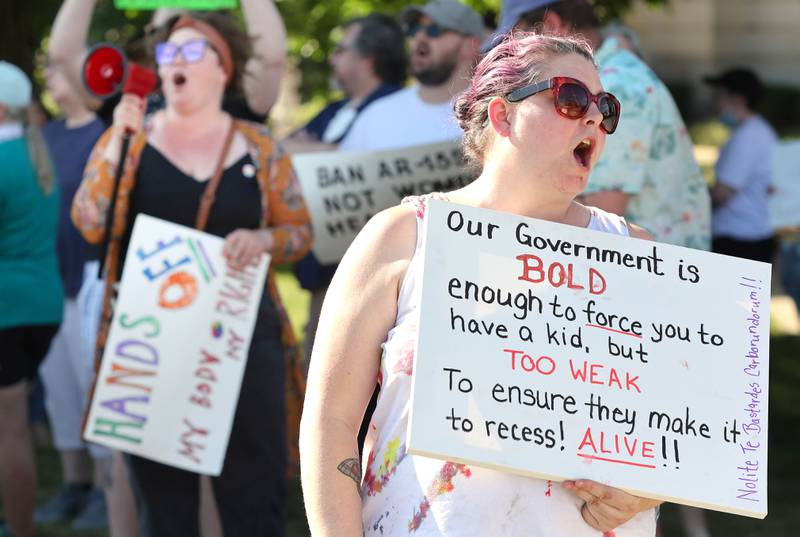 Larissa Vander Kurr, from Sycamore, chants with the crowd Friday, June 24, 2022, during a rally for abortion rights in front of the DeKalb County Courthouse in Sycamore. The group was protesting Friday's decision by the Supreme Court to overturn Roe v. Wade, ending constitutional protections for abortion.