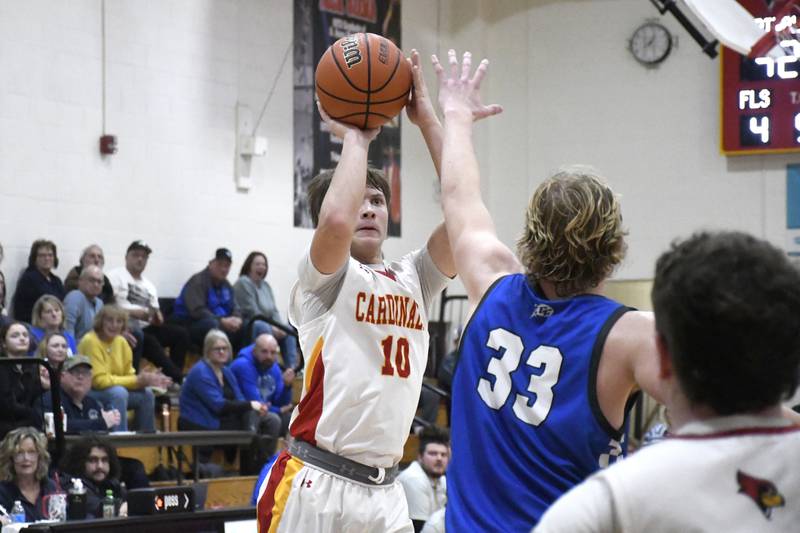 St. Anne's Grant Pomaranski elevates for a jumpshot while being guarded by Clifton Central's Jake Thompson during St. Anne's 61-56 victory over Clifton Central on Tuesday January 6, 2026.