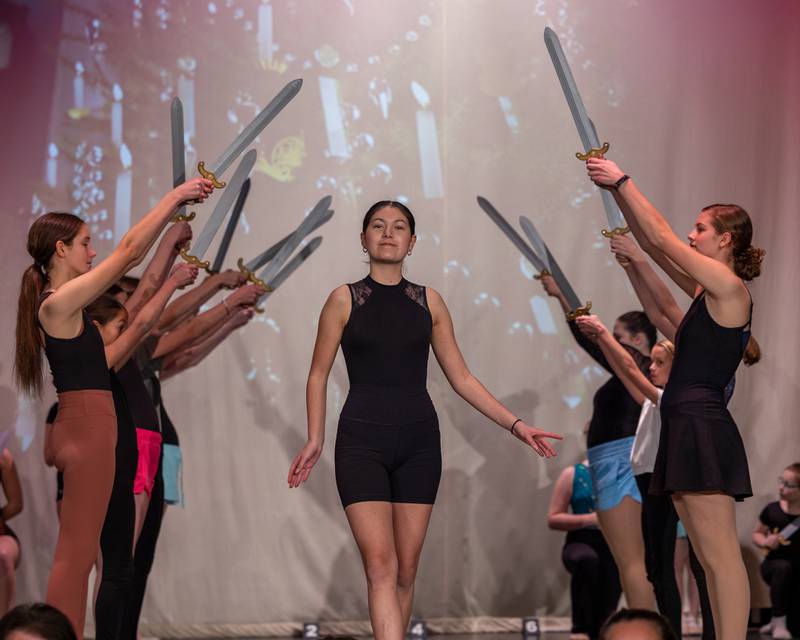 Performer dances through the Arch of Swords during performance of the "Nutcracker" on Monday, December 8, 2025 in the Matthiessen Memorial Auditorium at LaSalle-Peru Township High School in LaSalle.