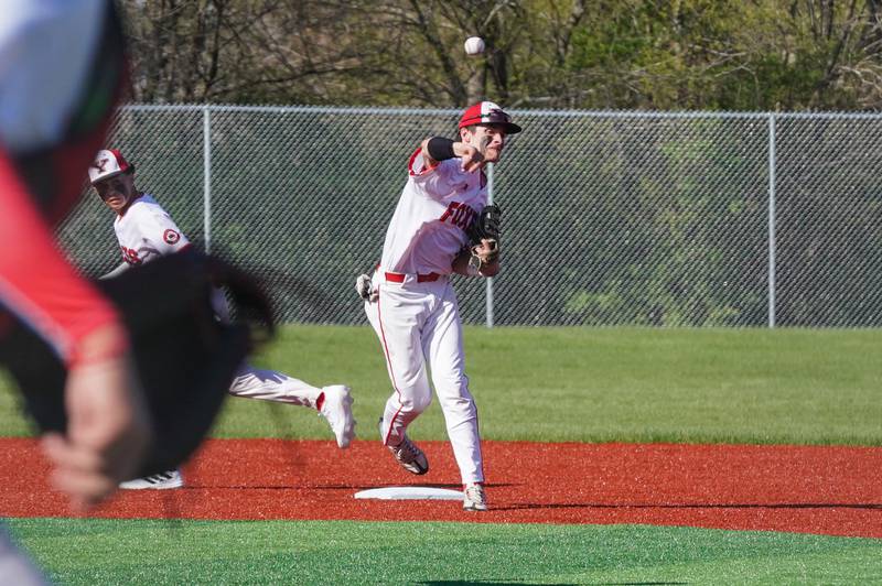 Yorkville's Jackson Roberts (13) turns a double play against West Aurora during a baseball game at Yorkville High School on Monday, April 15, 2024.