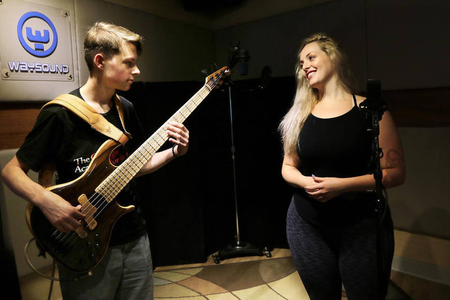 Matthew Jazwinski of Cary (left), 15, plays the guitar as he and Grace Kinstler of Lakewood, 17, rehearse the National Anthem at Waysound Studio on Tuesday, July 3, 2018 in Fox River Grove.  The duo will perform it live on August 19 at Guaranteed Rate Field in Chicago before the White Sox host the Kansas City Royals.