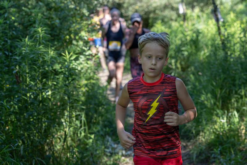 Axel Riffel runs at the 2025 Muddy Dash on Saturday, June 28, 2025 at Fox Valley Off Road in Utica.