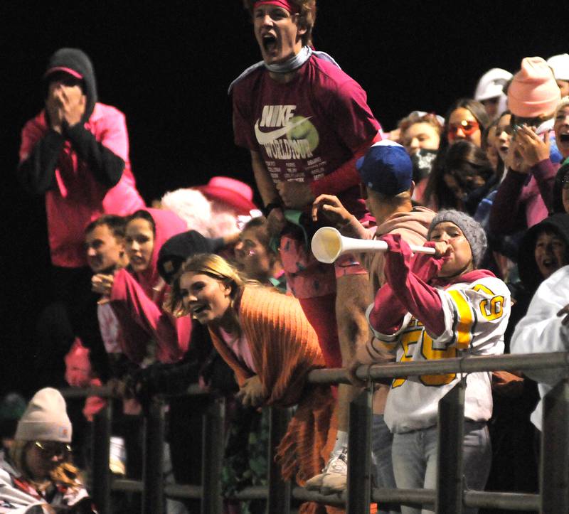 Seneca's Cassie Fosen (with horn) cheers in the visitor student section at Gould Stadium on Friday, Oct. 6, 2023.