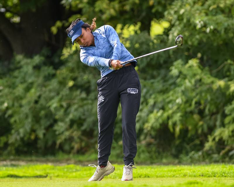 Oswego East's Shyell Lowe tees off the green during Class 3A Plainfield North Regional girls golf tournament on Thursday Sept. 28, 2023 at Whitetail Ridge in Yorkville.