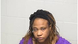 Woman charged after spitting at 2 deputies