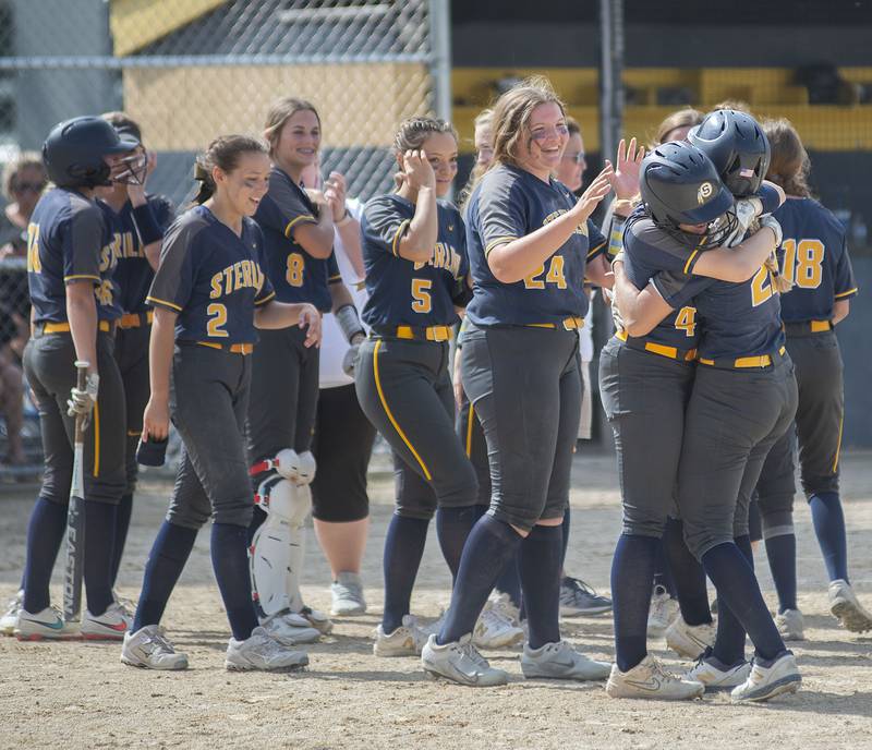 Sterling celebrates their 7-6 walk off regional final win against Dixon Saturday, May 28, 2022.