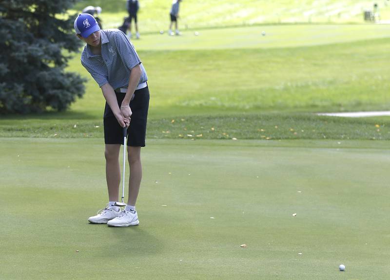 Burlington Central’s Ivan Larson putts on the 17th green during the Fox Valley Conference Boys Golf Tournament. Thursday, Sept. 22, 2022, at Randall Oaks Golf Club in West Dundee.