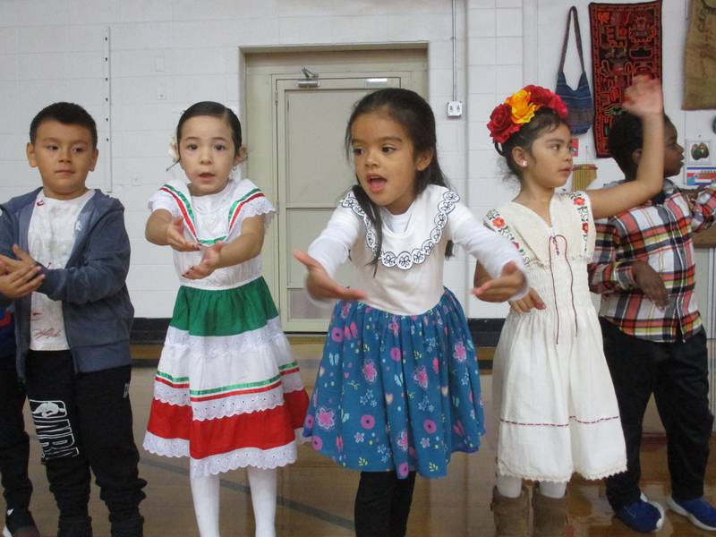 Yorkville kindergarteners perform for their schoolmates at a Hispanic Heritage Month assembly at Circle Center Grade School on Oct. 14, 2022. They include, from left, Aziel Rivera, Alayana Villanueva, Josslynn Gomez and Julianna Mendoza.