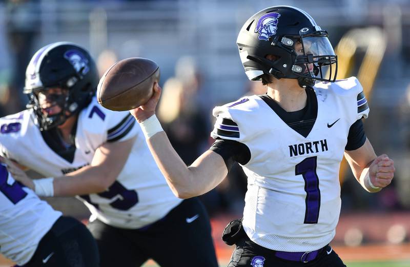 Downers Grove North quarterback Owen Lansu (1) fires a pass during an IHSA Class 7A quarterfinal game against Lincoln-Way West on Nov. 11, 2023 at Lincoln-Way West High School in New Lenox.