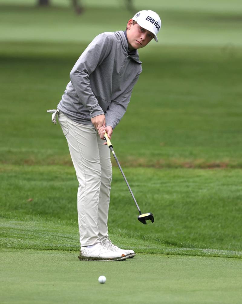 Sycamore’s Gavin Sedevie putts on the third green Wednesday, Sept. 27, 2023, during the Class 2A boys golf regional at Sycamore Golf Club.