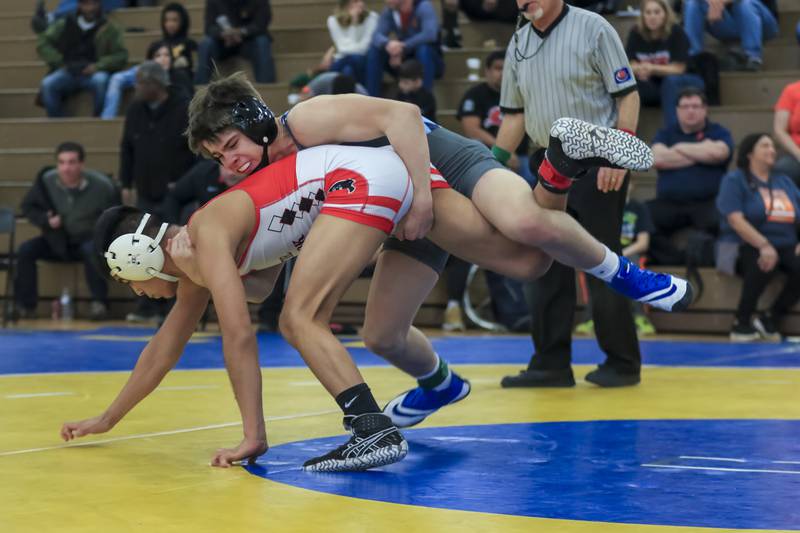 Downers Grove South's Jim Nugent wrestles at 120 pounds during the Lyons Class 3A Regional. Feb 8.