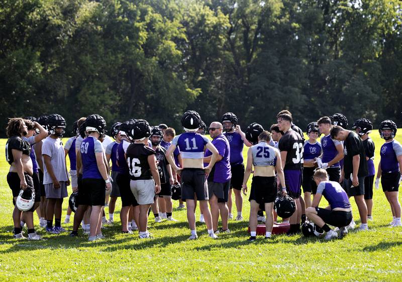 Dixon football coach Jaren Shaner meets with his team Monday, August 11, 2025, for the first day of football practice.