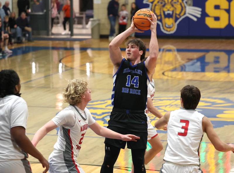 Hinckley-Big Rock's Martin Ledbetter shoots over Aurora Christian's Asa Johnson during their sectional final game Friday, March 7, 2025, at Somonauk High School.