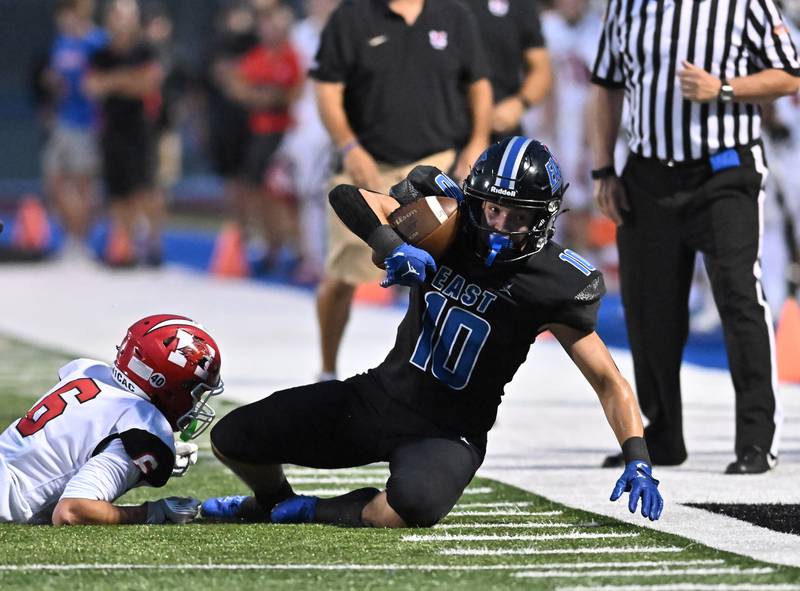 Lincoln-Way East's Mj Schley catches a pass during a non-conference game against Maine South on Friday, Aug. 30, 2024, at Frankfort. (Dean Reid for Shaw Local News Network)