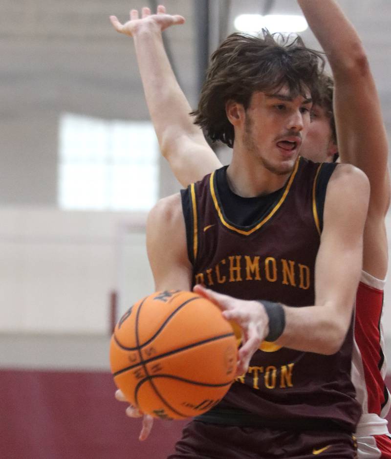 Richmond-Burton’s Matthew Rupnik looks for an option against Stillman Valley during 74th Annual E.C. Nichols Holiday Classic varsity boys basketball tournament action on Saturday, Dec. 28, 2024 at Marengo High School in Marengo.