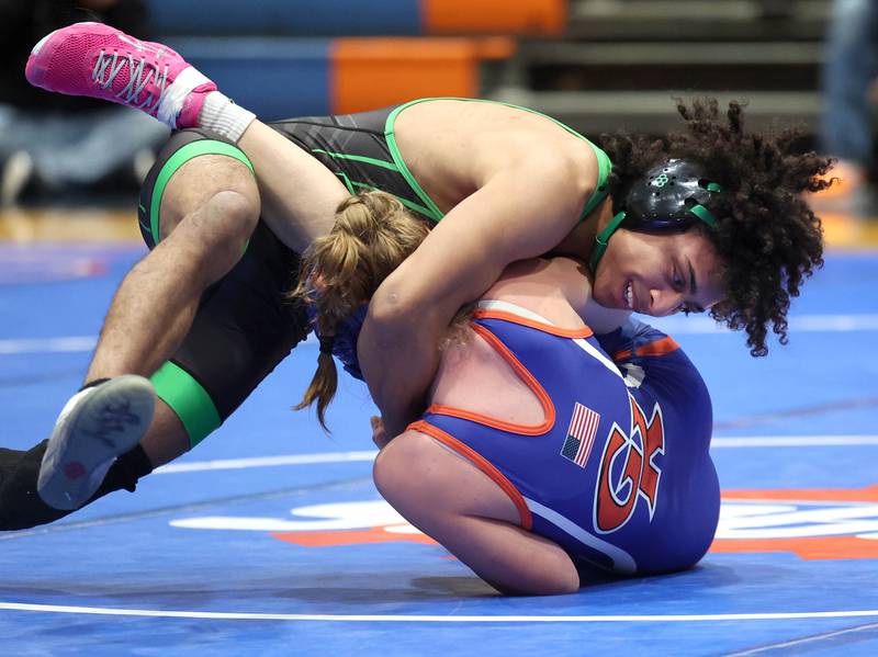 Rock Falls’ Adan Oquendo pins Genoa-Kingston's Lyla McKee Thursday, Jan. 16, 2025, during their 132 pound match at Genoa-Kingston High School.