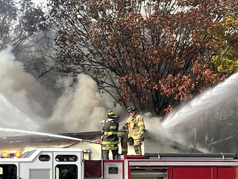 Joliet firefighters battle a fire in the Greenway Plaza, 1301 N. Broadway St., Joliet on Wednesday afternoon Oct. 30, 2024.